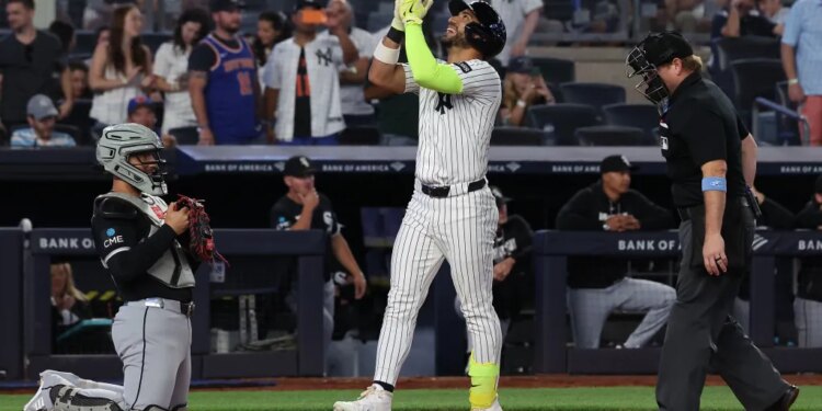 A smiling José Caballero looks up to the sky after belting a solo home run in the eighth inning of the Yankees' 12-2 blowout win over the White Sox on June 16, 2026 at the Stadium.