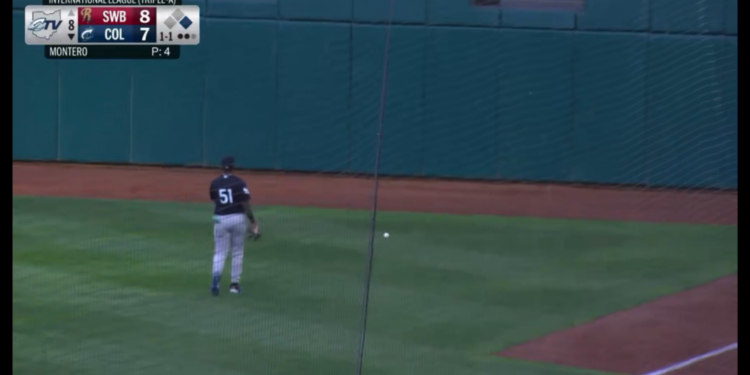 Yanquiel Fernandez walks to get the ball, causing an inside the park homerun.