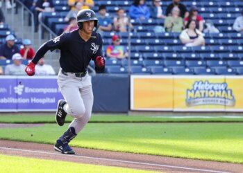 George Lombard Jr., running the bases during a Triple-A game earlier this season, "sprained a couple fingers" after  jamming his left hand into a base stealer while covering second base during Tuesday's game.