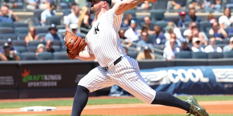 New York Yankees pitcher Carlos Rodón (55) pitches in the first inning.