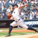 New York Yankees pitcher Carlos Rodón (55) pitches in the first inning.