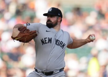 New York Yankees pitcher Carlos RodÛn throws against the Detroit Tigers during the first inning of a baseball game Tuesday, June 23, 2026, in Detroit. (AP Photo/Paul Sancya)