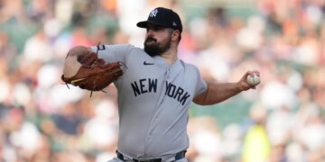New York Yankees pitcher Carlos RodÛn throws against the Detroit Tigers during the first inning of a baseball game Tuesday, June 23, 2026, in Detroit. (AP Photo/Paul Sancya)