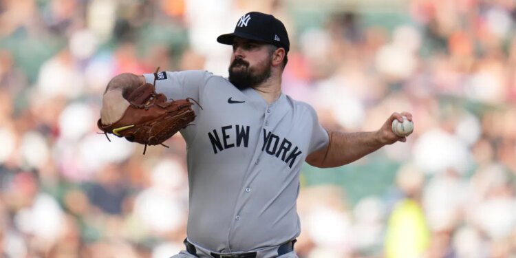 New York Yankees pitcher Carlos RodÛn throws against the Detroit Tigers during the first inning of a baseball game Tuesday, June 23, 2026, in Detroit. (AP Photo/Paul Sancya)