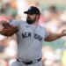 New York Yankees pitcher Carlos RodÛn throws against the Detroit Tigers during the first inning of a baseball game Tuesday, June 23, 2026, in Detroit. (AP Photo/Paul Sancya)