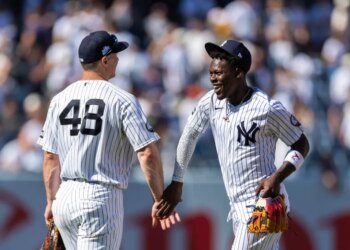 New York Yankees first baseman Paul Goldschmidt (48) celebrates with second baseman Jazz Chisholm Jr. (13).