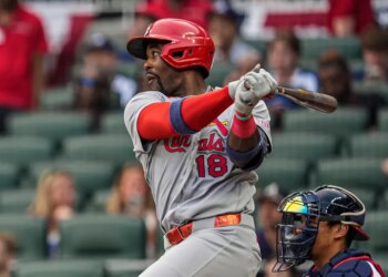 St. Louis Cardinals right fielder Jordan Walker (18) hitting a single against the Atlanta Braves.
