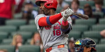 St. Louis Cardinals right fielder Jordan Walker (18) hitting a single against the Atlanta Braves.