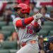 St. Louis Cardinals right fielder Jordan Walker (18) hitting a single against the Atlanta Braves.
