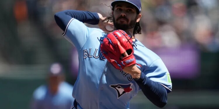 Toronto Blue Jays pitcher Dylan Cease throws during a baseball game.