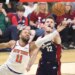 New York Knicks guard Jalen Brunson (11) shoots as Cleveland Cavaliers forward Dean Wade (32) defends during the first quarter.