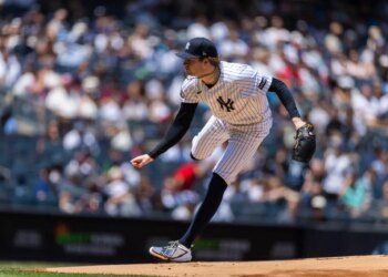 New York Yankees pitcher Cam Schlittler (31) throws a pitch in the first inning against the Boston Red Sox at Yankee Stadium.