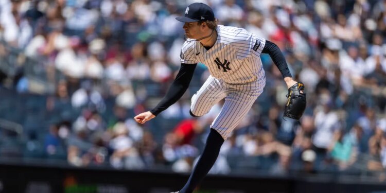 New York Yankees pitcher Cam Schlittler (31) throws a pitch in the first inning against the Boston Red Sox at Yankee Stadium.