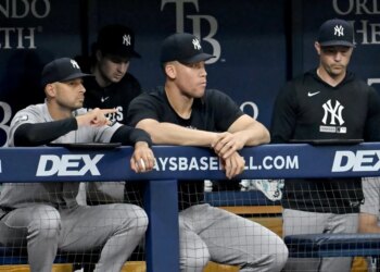 Jake Hirst and Aaron Judge in the dugout.