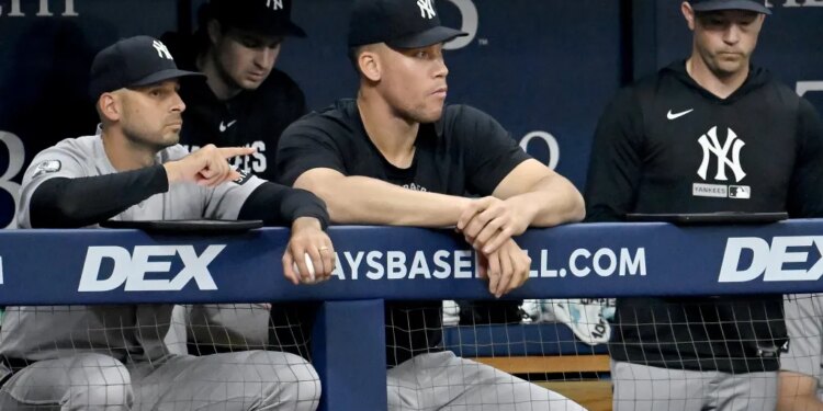 Jake Hirst and Aaron Judge in the dugout.