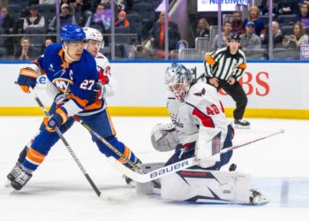 New York Islanders left wing Anders Lee (27) pressures Washington Capitals goaltender Logan Thompson (48) during the first period at UBS Arena.