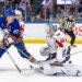New York Islanders left wing Anders Lee (27) pressures Washington Capitals goaltender Logan Thompson (48) during the first period at UBS Arena.