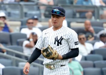 Yankees shortstop Anthony Volpe (11) in the field against the Minnesota Twins.