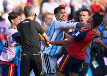 Soccer players from Spain and Argentina brawling during the World Cup final.