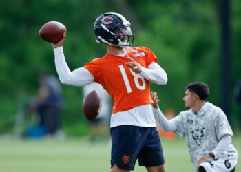 Jun 11, 2026; Lake Forest, IL, USA; Chicago Bears quarterback Caleb Williams (18) looks to pass the ball during Minicamp at Halas Hall.