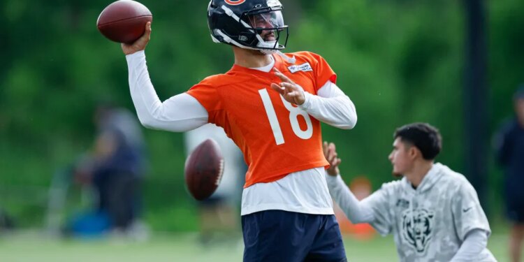 Jun 11, 2026; Lake Forest, IL, USA; Chicago Bears quarterback Caleb Williams (18) looks to pass the ball during Minicamp at Halas Hall.