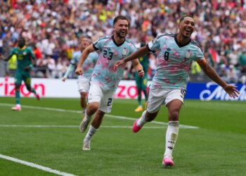Youri Tielemans (8) celebrates after scoring the game-winning goal on a penalty kick in extra time of Belgium's 3-2 win over Senegal in round of 32 action at the World Cup in Seattle.