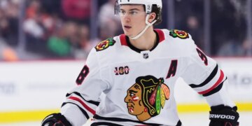 Connor Bedard playing during an NHL hockey game.