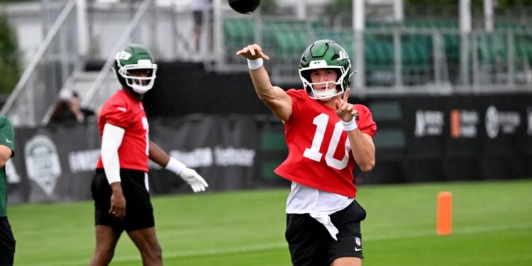 Jets rookie quarterback Cade Klubnik (10) throws a pass at training camp on July 30, 2026.