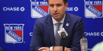 Chris Drury, President and General Manager of the New York Rangers, speaks at a press conference.