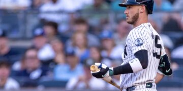 New York Yankees left fielder Cody Bellinger reacting after striking out swinging.