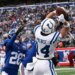 Indianapolis Colts wide receiver Alec Pierce (14) catches a touchdown pass against a Giants defender.