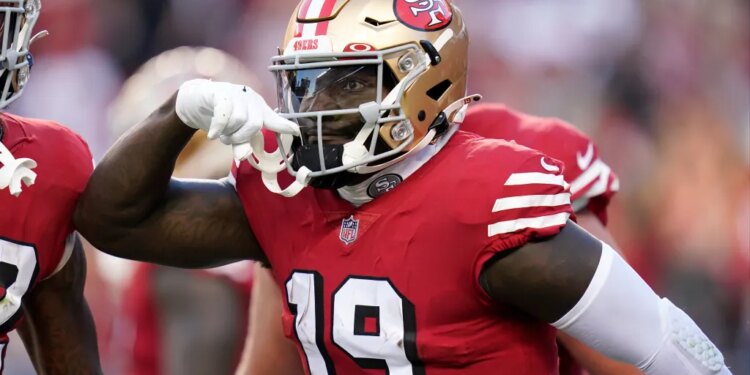 San Francisco 49ers wide receiver Deebo Samuel (19) celebrates after scoring against the Los Angeles Rams during the first half of an NFL football game in Santa Clara, Calif., Monday, Oct. 3, 2022.