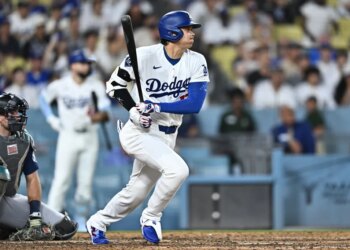 Shohei Ohtani rips an RBI double during the Dodgers' 7-6 loss to the Mariners on July 28, 2026 in Los Angeles.