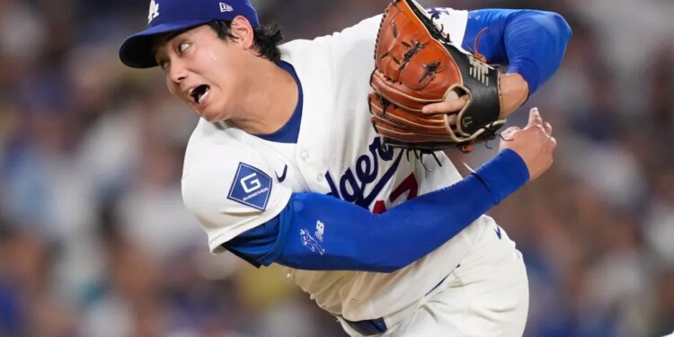 Shohei Ohtani pitching in a Dodgers uniform.
