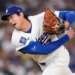 Shohei Ohtani pitching in a Dodgers uniform.