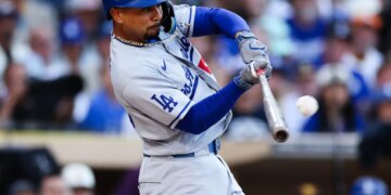 Mookie Betts belts a solo homer in the first inning of the Dodgers' loss to the Padres.