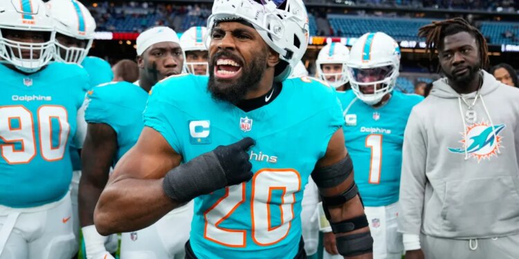 Miami Dolphins linebacker Jordyn Brooks (20) reacts as he warms-up before a game.