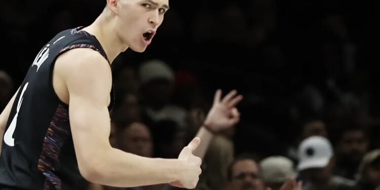 Egor Dëmin, celebrating during a game last season, says he's looking to build a connection with Mikel Brown, the Nets' 2026 top pick and his other teammates at the upcoming NBA Summer League.