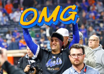 Jose Iglesias #11 of the New York Mets celebrates with an "OMG" sign after defeating the Philadelphia Phillies in Game 4 of the NLDS.