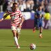 Tyler Adams, heading up field during USMNT's win over Herzegovina, says the team has great respect for Belgium, who plays "attacking football."