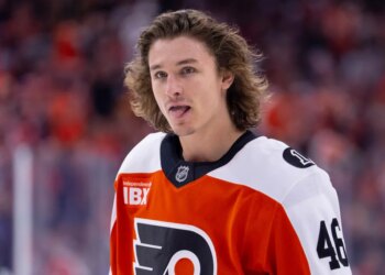 Philadelphia Flyers center Trevor Zegras looks on.