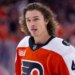 Philadelphia Flyers center Trevor Zegras looks on.