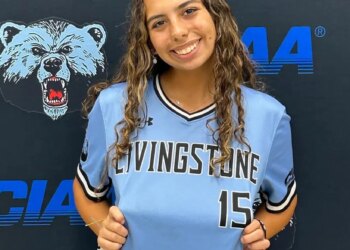 Livingstone College softball player Gabriella Muñoz wearing her light blue and black jersey with the number 15.