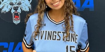 Livingstone College softball player Gabriella Muñoz wearing her light blue and black jersey with the number 15.