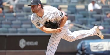 New York Yankees pitcher Gerrit Cole (45) throws a pitch.