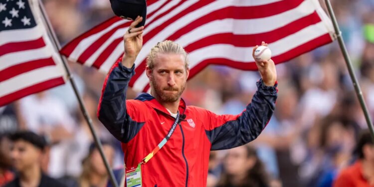 USMNT captain Tim Ream acknowledges the crowd during a ceremonial first pitch ceremony for the team before the Mariners' game against the Blue Jays on July 3, 2026 in Seattle.