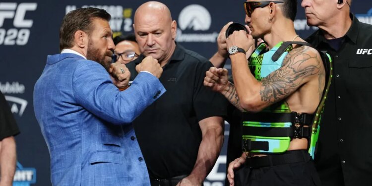 Conor McGregor and Max Holloway face off at the UFC 329 press conference.