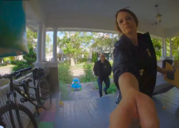 ICE agents at David Streever’s door. Image courtesy of FIRE.