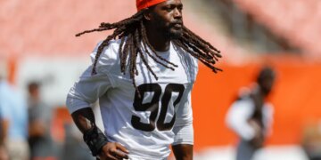 Cleveland Browns' Jadeveon Clowney jogs onto the field during an NFL football practice at FirstEnergy Stadium on Thursday, June 16, 2022, in Cleveland.