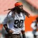 Cleveland Browns' Jadeveon Clowney jogs onto the field during an NFL football practice at FirstEnergy Stadium on Thursday, June 16, 2022, in Cleveland.